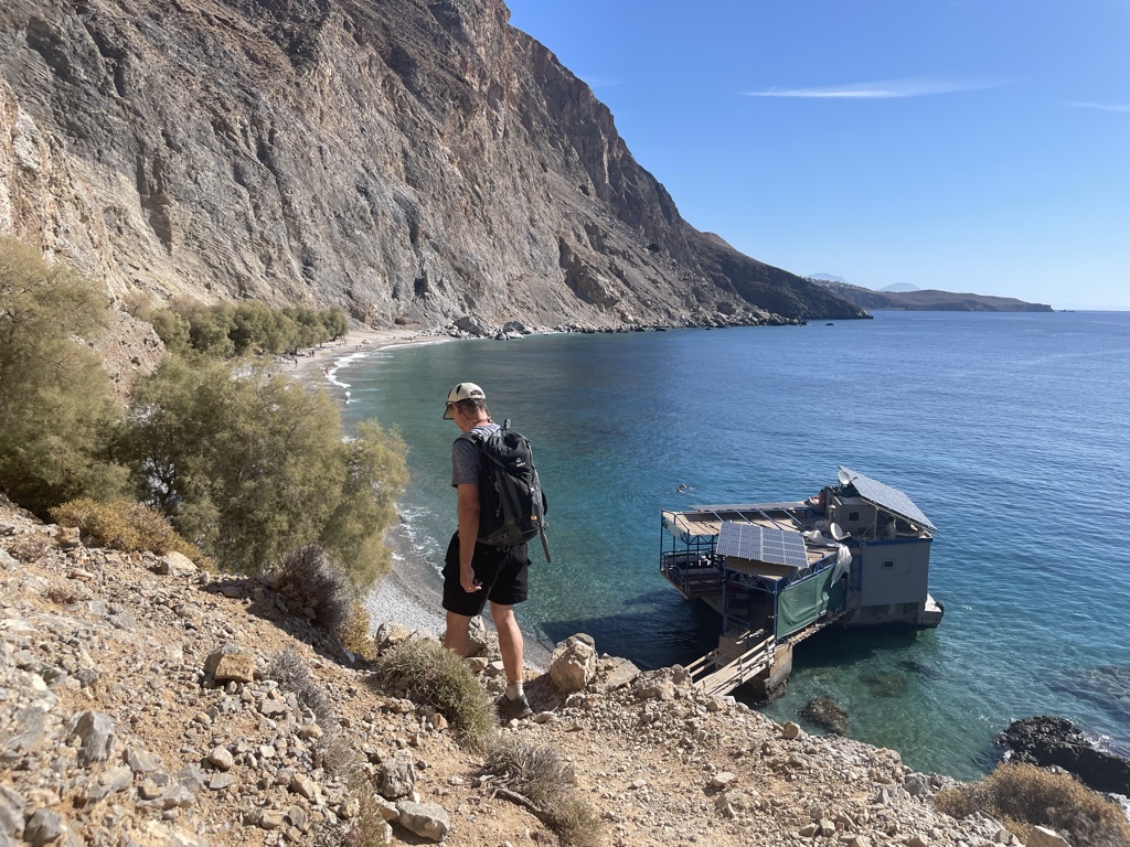 Descending to the famous floating taverna. You can’t see the nude people, but there are many in the distance.