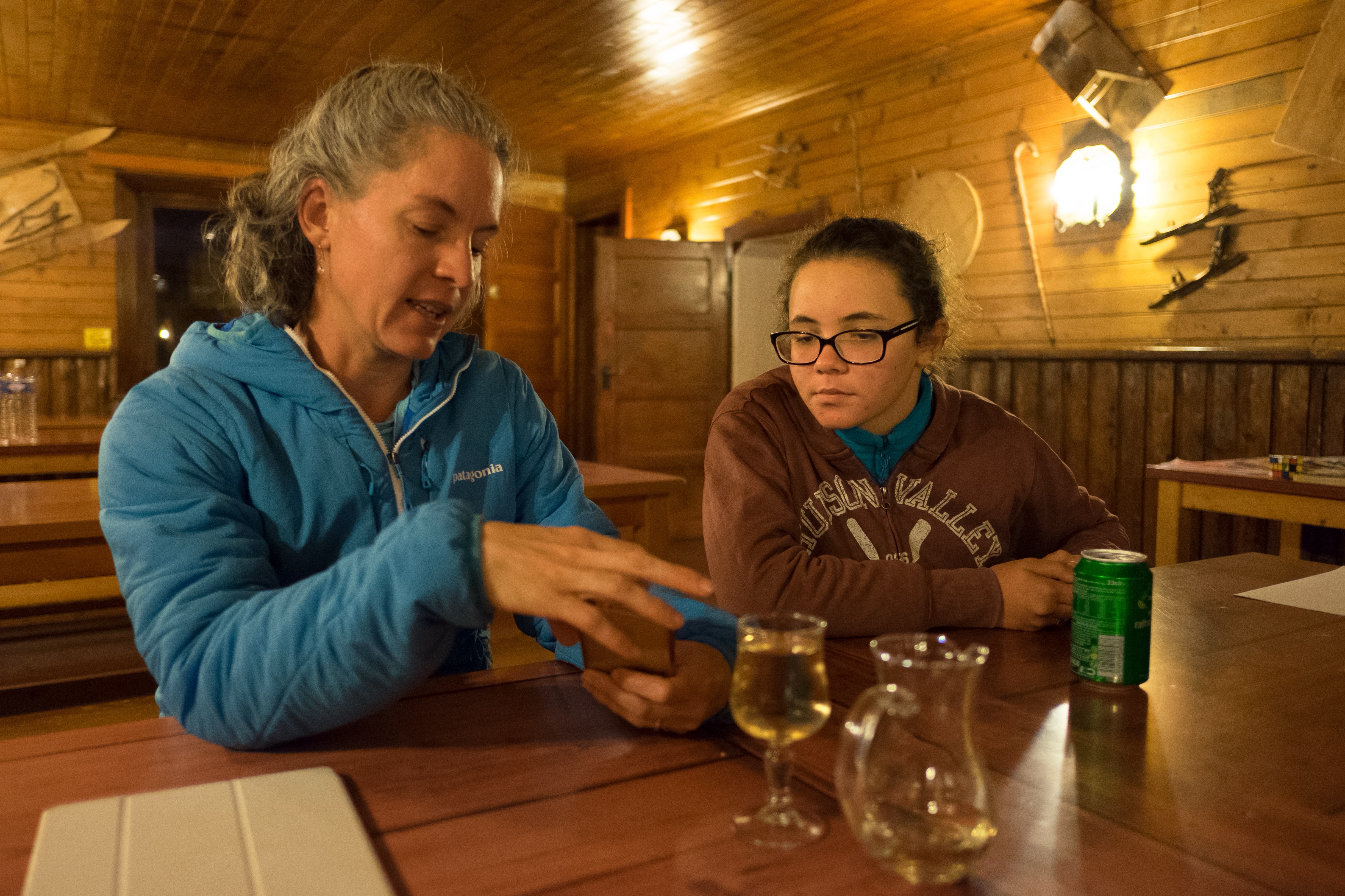 Showing pictures of my own kids to my new friend.