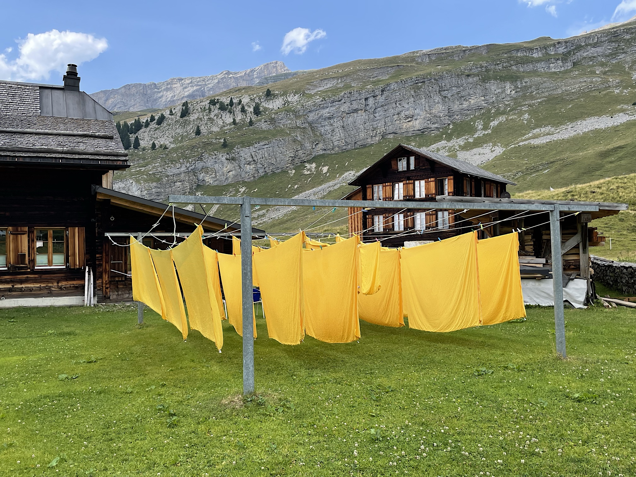 The auberge drying its saffron-colored sheets in the sunshine.