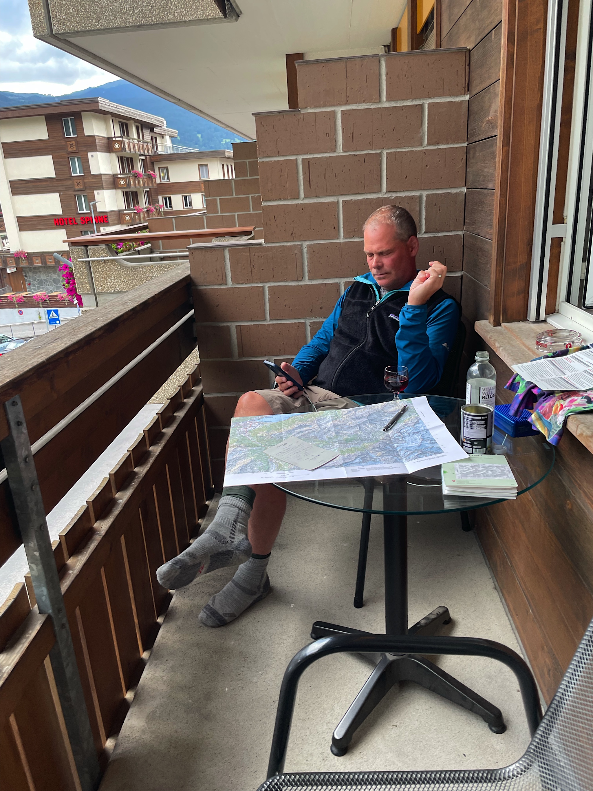 Chris does a little map work on the balcony.