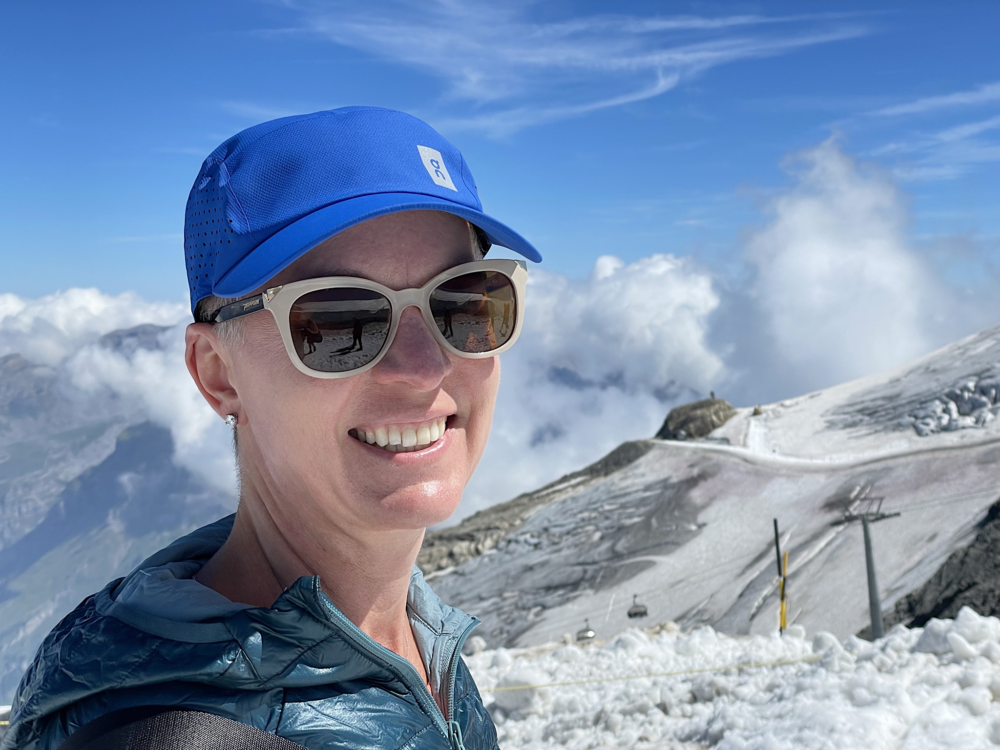 I bought a blue On baseball cap to replace my LSU digicamo cap that I’d left behind in Sargans.