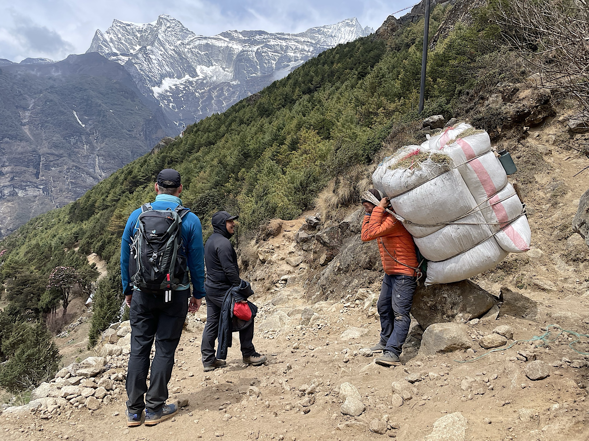 Porters carrying construction materials up to Namche.
