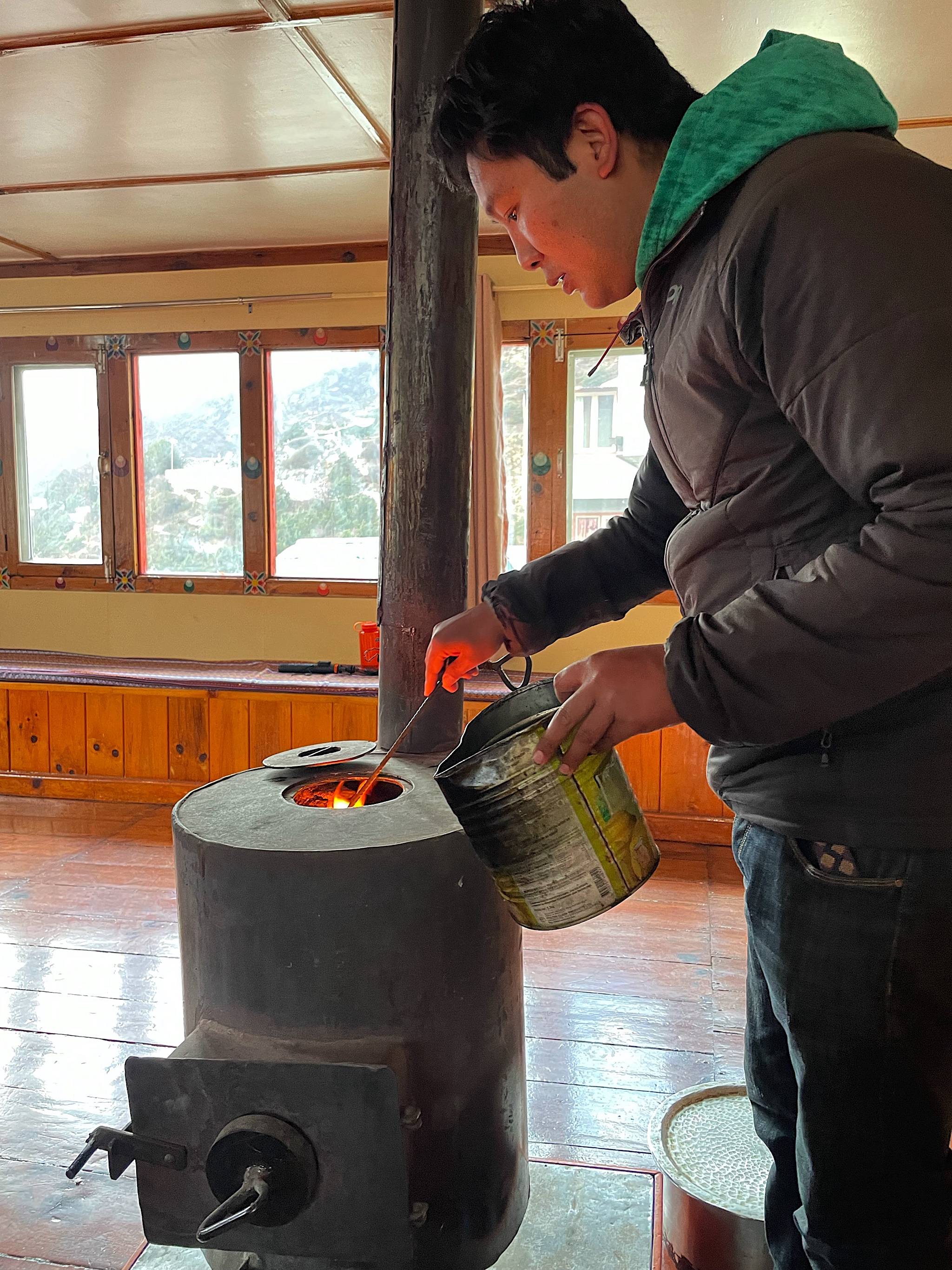 Custom is to pour kerosene or lighter fluid or something onto the dung to help it ignite.