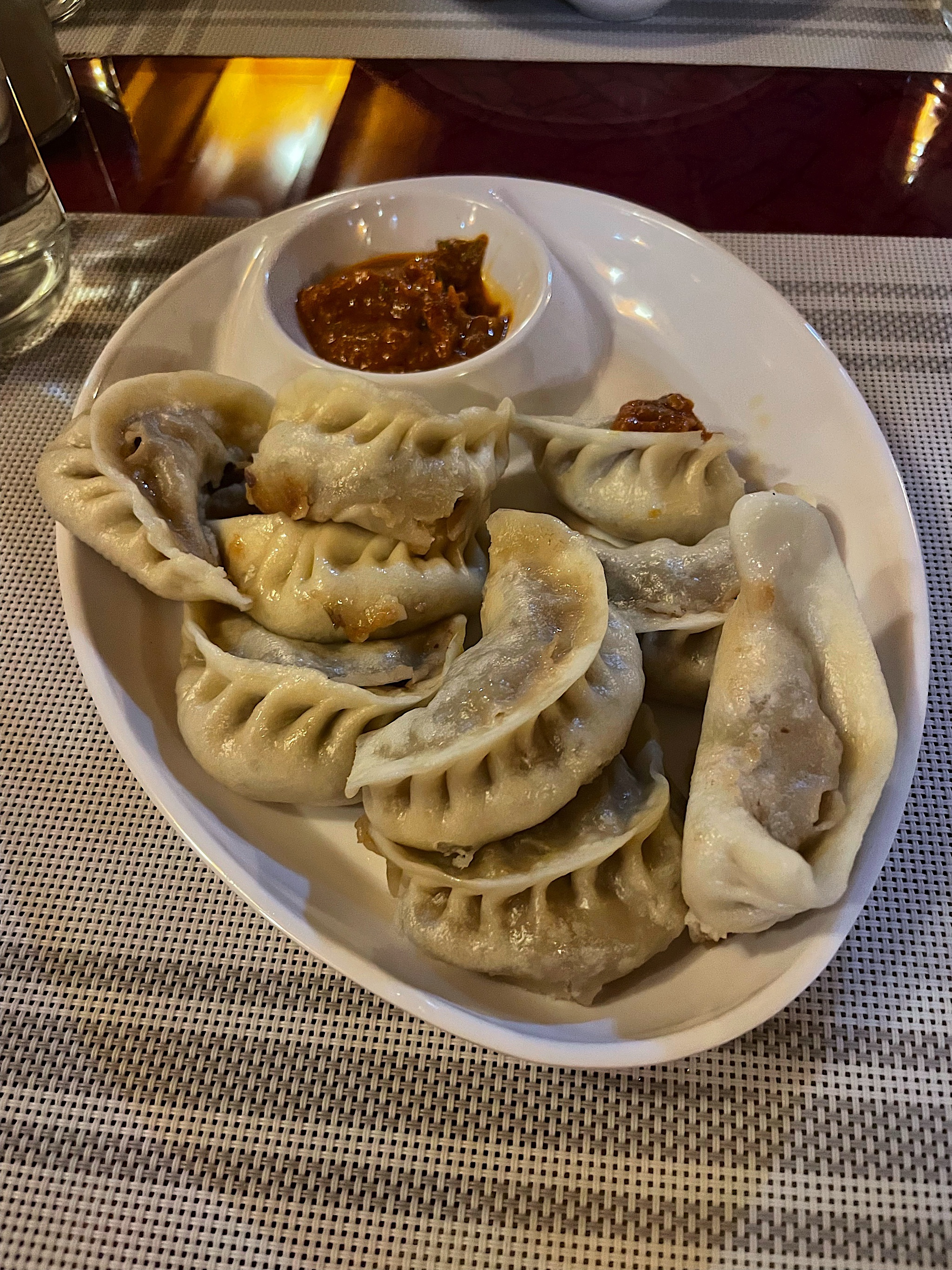 I had momos, a Nepali standby. These are made correctly, unlike the ones I made when our son’s mother-in-law tried to teach me how to shape them. That crescent shape is surprisingly difficult to form!